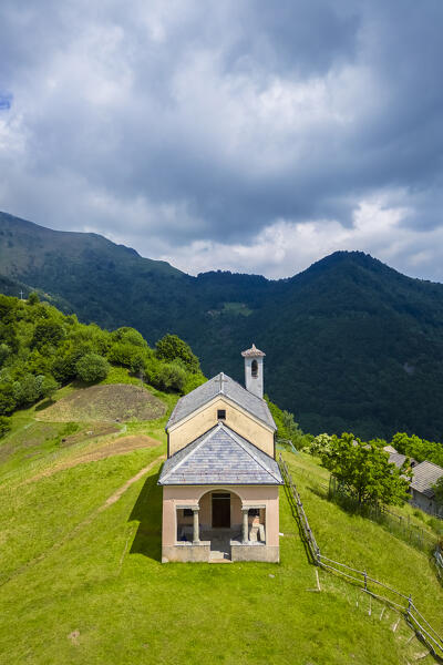 Aerial view of the small church at Alpe Loccia. Chesio, Loreglia, Alpe Loccia, Valstrona, Verbano Cusio Ossola district, Piedmont, Italy.