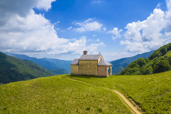Aerial view of the small church at Alpe Loccia. Chesio, Loreglia, Alpe Loccia, Valstrona, Verbano Cusio Ossola district, Piedmont, Italy.
