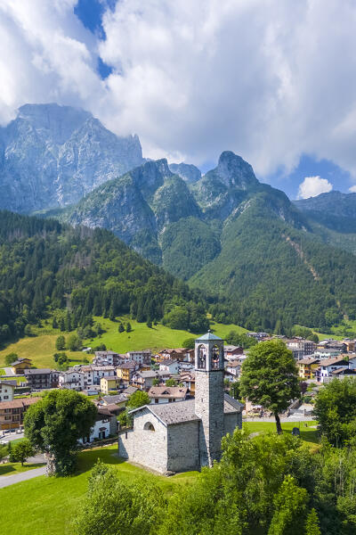 Aerial view of the small church called Cesulì in Colere town with view of the north face of the Presolana mountain in summer. Colere, Val di Scalve, Bergamo district, Lombardy, Italy, Southern Europe.