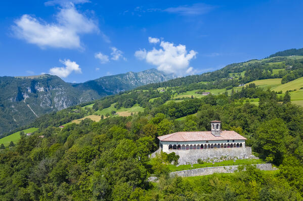 Aerial view of the Santissima Trinità di Parre church on a hill overlooking Valle Seriana. Val Seriana, Bergamo province, Lombardy, Italy.