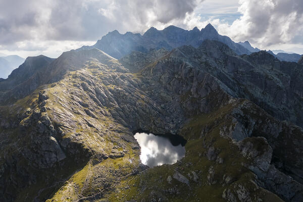 Aerial view of Lago Piazzotti at sunset. Ornica, Val Salmurano, Val Brembana, Alpi Orobie, Bergamo, Bergamo Province, Lombardy, Italy, Europe.