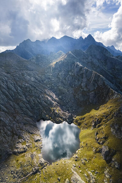 Aerial view of Lago Piazzotti at sunset. Ornica, Val Salmurano, Val Brembana, Alpi Orobie, Bergamo, Bergamo Province, Lombardy, Italy, Europe.