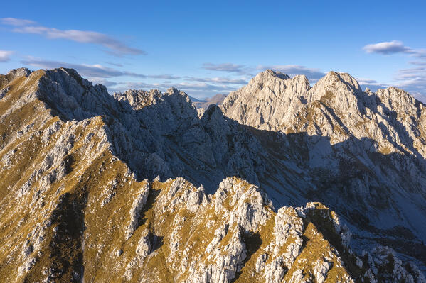 Aerial view of the Corna di San Fermo and Cima Moren, part of Pizzo Camino, at sunset. Borno, Valcamonica, brescia district, Lombardy, Italy.