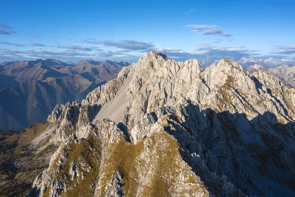 Aerial view of the Corna di San Fermo and Cima Moren, part of Pizzo Camino, at sunset. Borno, Valcamonica, brescia district, Lombardy, Italy.