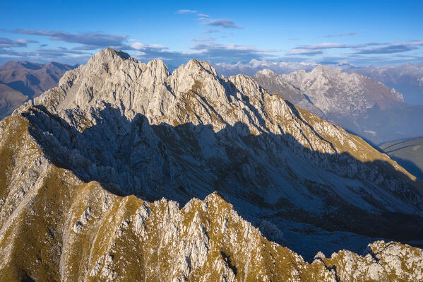 Aerial view of the Corna di San Fermo and Cima Moren, part of Pizzo Camino, at sunset. Borno, Valcamonica, brescia district, Lombardy, Italy.