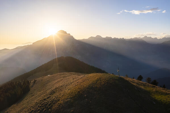 Aerial view of the Presolana mount at sunset in autumn from Malga Costone, part of Pizzo Camino. Borno, Valcamonica, brescia district, Lombardy, Italy.