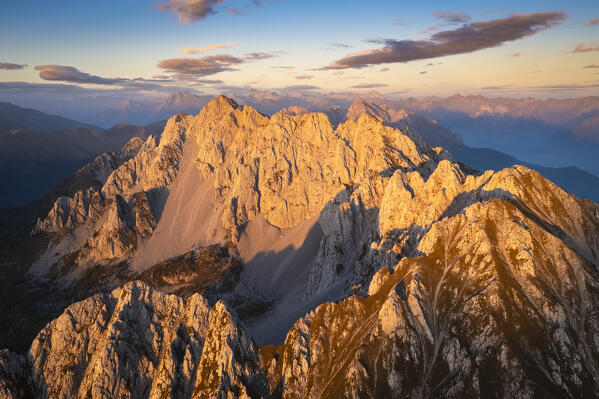 Aerial view of the Corna di San Fermo and Cima Moren, part of Pizzo Camino, at sunset. Borno, Valcamonica, brescia district, Lombardy, Italy.