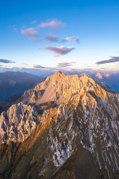 Aerial view of the Corna di San Fermo and Cima Moren, part of Pizzo Camino, at sunset. Borno, Valcamonica, brescia district, Lombardy, Italy.