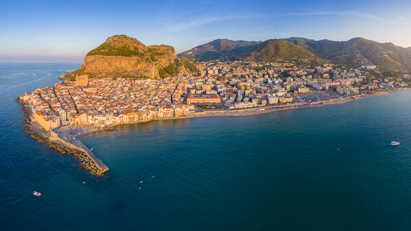 Aerial view of the ancient town of Cefalù, Unesco World Heritage site, at sunset. Palermo district, Sicily, Italy.