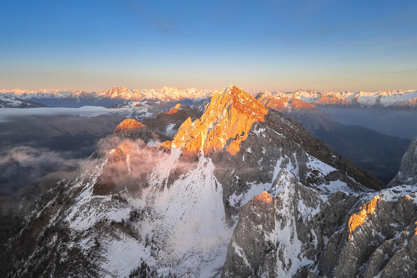 Aerial view of the Monte Sossino mount at sunset in winter. Schilpario, Val di Scalve, bergamo district, Lombardy, Italy.