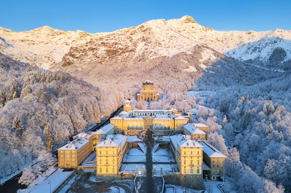 Aerial view of the Sanctuary of Oropa in winter at dawn. Biella, Biella district, Piedmont, Italy, Europe.