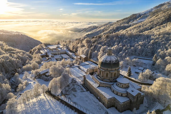 Aerial view of the Sanctuary of Oropa in winter at dawn. Biella, Biella district, Piedmont, Italy, Europe.