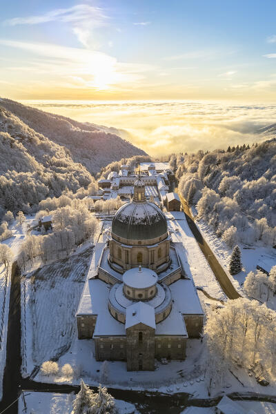 Aerial view of the Sanctuary of Oropa in winter at dawn. Biella, Biella district, Piedmont, Italy, Europe.