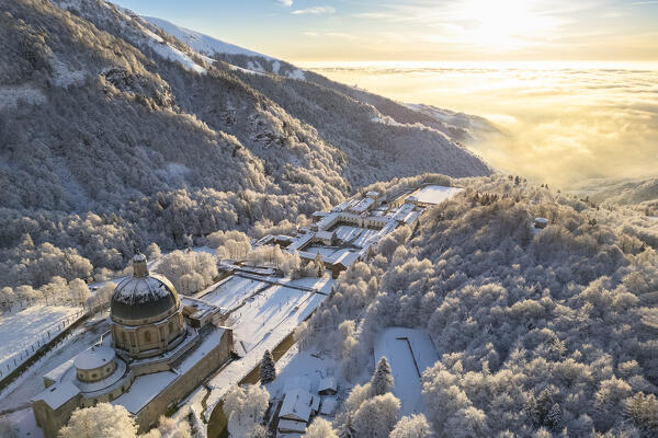 Aerial view of the Sanctuary of Oropa in winter at dawn. Biella, Biella district, Piedmont, Italy, Europe.