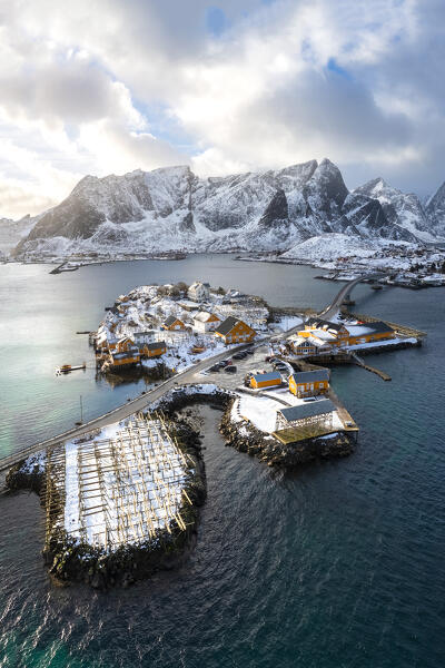 Aerial view of the Sakrisøya island and Reine Bay towards Reinebringen in winter, Lofoten Islands, Norway.