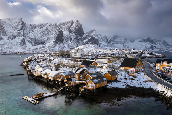 Aerial view of the Sakrisøya island and Reine Bay towards Reinebringen in winter, Lofoten Islands, Norway.