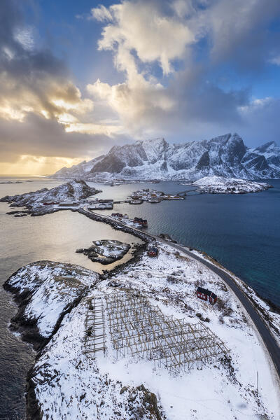 Aerial view of the Sakrisøya island and Reine Bay towards Reinebringen in winter, Lofoten Islands, Norway.