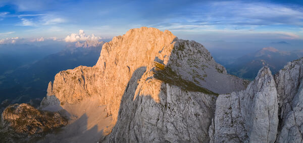 Aerial view of north face of the Presolana at sunset. Val di Scalve, Bergamo district, Lombardy, Italy, Southern Europe.