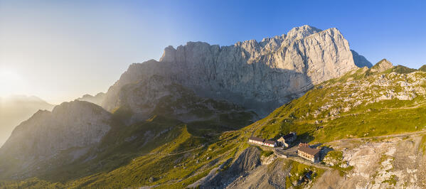 Aerial view of the Albani refuge and the north face of the Presolana at dawn. Val di Scalve, Bergamo district, Lombardy, Italy, Southern Europe.