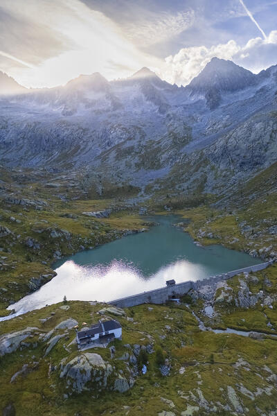 View of the Gnutti refuge and Lake Miller in the beautiful Val Miller. Sonico, Val Camonica, Brescia district, Lombardy, Italy.
