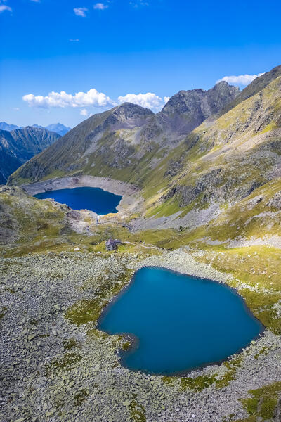 View of the Franco Tonolini refuge and Lake Rotondo in the beautiful Val Miller. Sonico, Val Camonica, Brescia district, Lombardy, Italy.