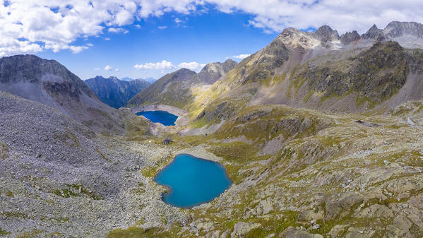 View of the Franco Tonolini refuge and Lake Rotondo in the beautiful Val Miller. Sonico, Val Camonica, Brescia district, Lombardy, Italy.