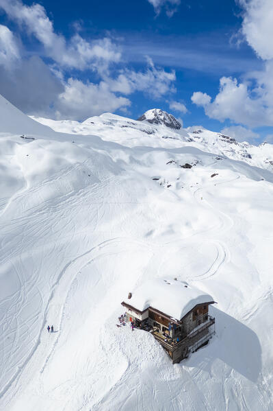 Aerial view of the Albani refuge and Monte Ferrante and Ferrantino in winter. Val di Scalve, Bergamo district, Lombardy, Italy, Southern Europe.