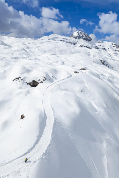 Aerial view of the trail from Albani refuge towards Monte Ferrante and Ferrantino in winter. Val di Scalve, Bergamo district, Lombardy, Italy, Southern Europe.