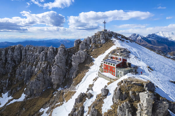 Aerial view of the top of Monte Resegone and Rifugio Azzoni in winter. Lecco, Lombardy, Italy, Europe.