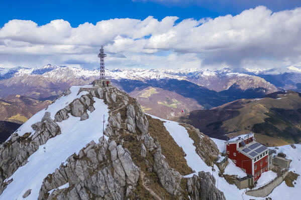 Aerial view of the top of Monte Resegone and Rifugio Azzoni in winter. Lecco, Lombardy, Italy, Europe.