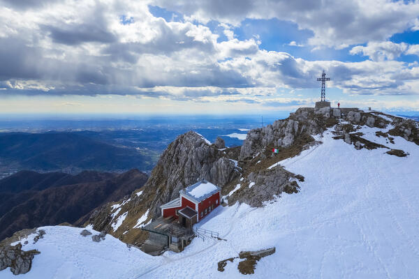 Aerial view of the top of Monte Resegone and Rifugio Azzoni in winter. Lecco, Lombardy, Italy, Europe.