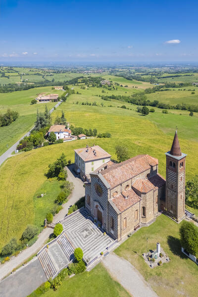 Aerial view of the church of San Savino in the town of Rezzanello. Piacenza district, Emilia-Romagna, Italy.