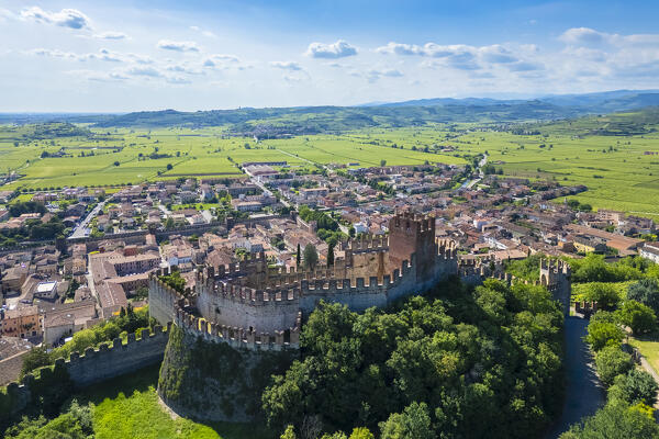 Aerial view of the Scaligero castle of Soave in summer. Verona district, Veneto, Italy, Europe.