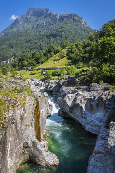 Aerial view of a small bridge over the emerald waters of river Verzasca. Verzasca, Verzasca Valley, Locarno, Canton Ticino, Switzerland, Western Europe.