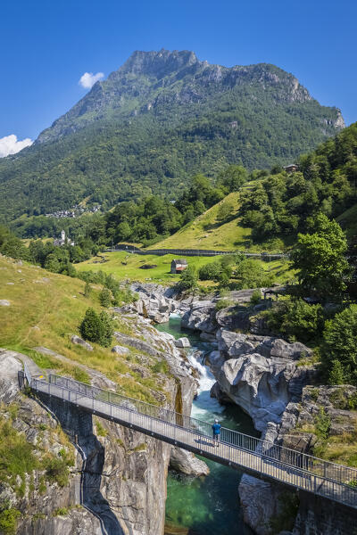 Aerial view of a small bridge over the emerald waters of river Verzasca. Verzasca, Verzasca Valley, Locarno, Canton Ticino, Switzerland, Western Europe.