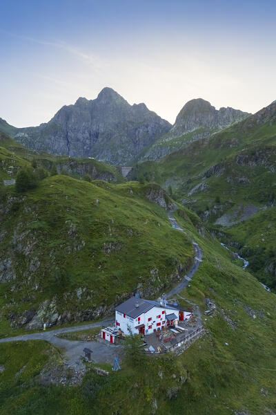 Aerial view of Longo refuge and Monte Aga at dawn in summer. Carona, Val Brembana, Alpi Orobie, Bergamo, Bergamo Province, Lombardy, Italy, Europe.