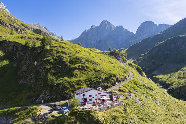 Aerial view of Longo refuge and Monte Aga at dawn in summer. Carona, Val Brembana, Alpi Orobie, Bergamo, Bergamo Province, Lombardy, Italy, Europe.