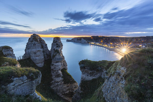 View of the cliffs of Etretat at sunrise, Octeville sur Mer, Le Havre, Seine Maritime, Normandy, France, Western Europe.
