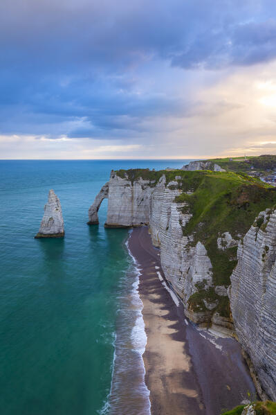 View of the arch and needle of Etretat at sunrise, Octeville sur Mer, Le Havre, Seine Maritime, Normandy, France, Western Europe.
