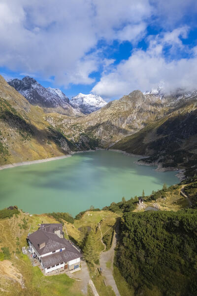 Aerial view of the artificial lake of Barbellino and Curò refuge. Valbondione, Seriana Valley, Lombardy, Bergamo province, Italy.