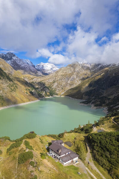 Aerial view of the artificial lake of Barbellino and Curò refuge. Valbondione, Seriana Valley, Lombardy, Bergamo province, Italy.