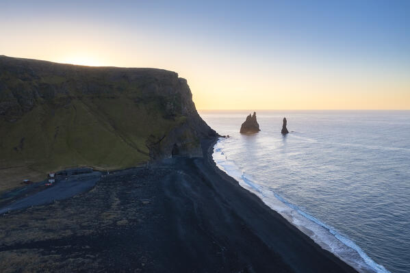 Aerial view of a sunrise at Reynisfjara beach, Vík í Mýrdal, Southern Iceland, Iceland, Northern Europe.