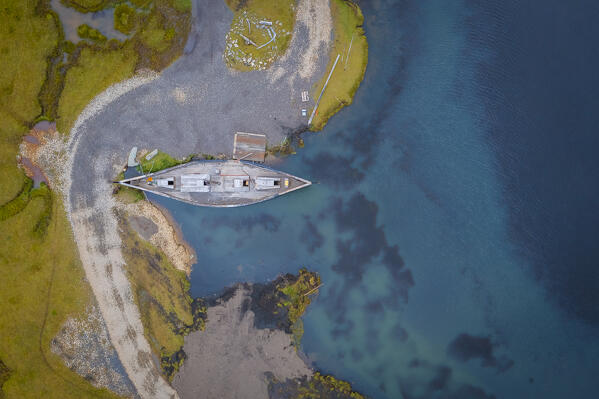 Aerial view of an abandoned Viking village film set in front of Vestrahorn mountain. Stokksnes peninsula, Hofn, Austurland, Iceland, Europe.