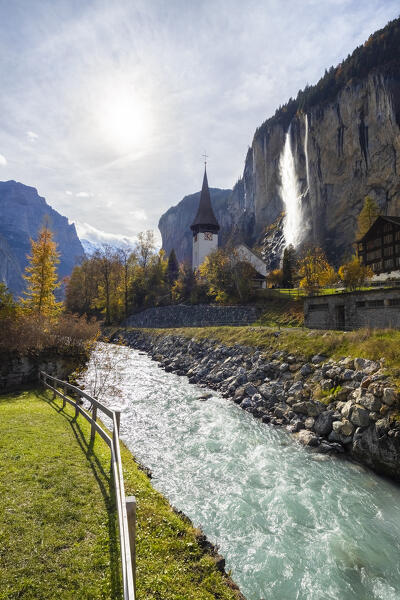 View of the village and waterfall of Lauterbrunnen. Lauterbrunnen, Canton of Bern, Switzerland, Europe.