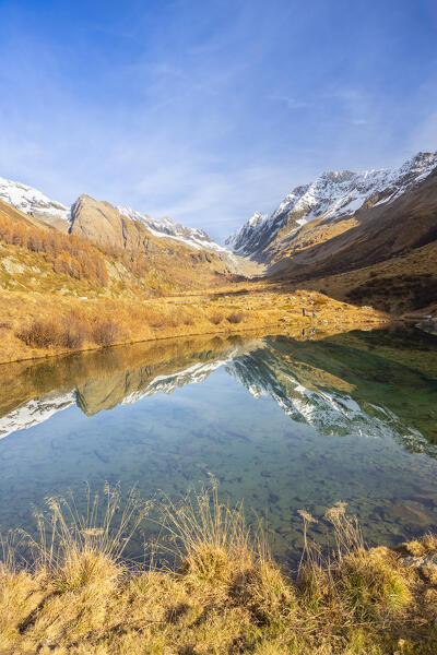 View of the Grundsee in Lotschental valley in autumn. Bernese Alps, canton of Valais, Switzerland.