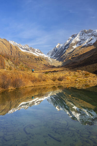 View of the Grundsee in Lotschental valley in autumn. Bernese Alps, canton of Valais, Switzerland.