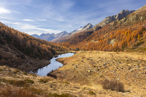 View of the Grundsee in Lotschental valley in autumn. Bernese Alps, canton of Valais, Switzerland.