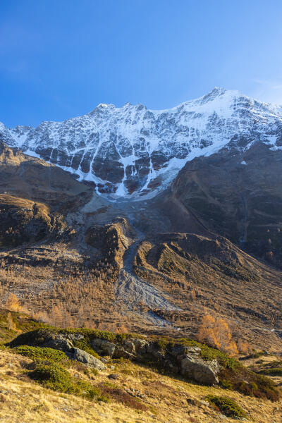 View of the Lotschental valley in autumn. Bernese Alps, canton of Valais, Switzerland.