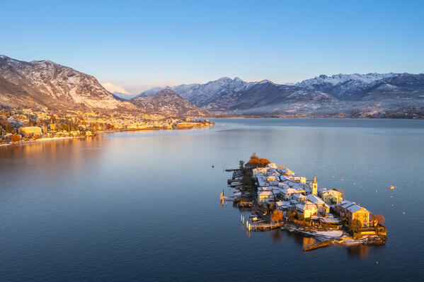 Aerial view of the Borromean Islands during a winter sunrise after a snowfall. Stresa, Lago Maggiore, Verbano Cusio Ossola district, Piedmont, Italy.