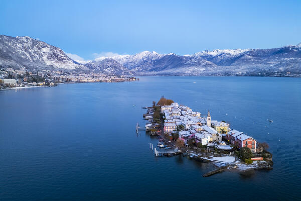 Aerial view of the Borromean Islands during a winter sunrise after a snowfall. Stresa, Lago Maggiore, Verbano Cusio Ossola district, Piedmont, Italy.